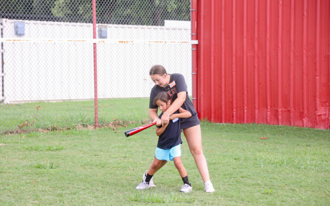 Coach Birkel enjoys softball summer camp